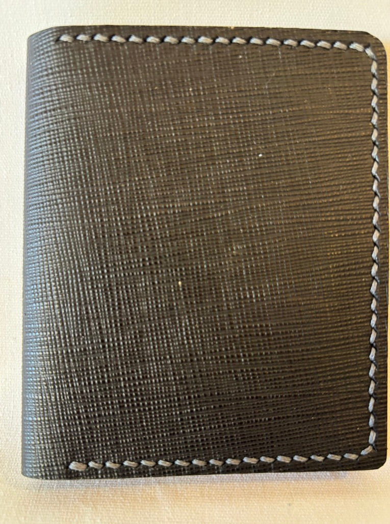 Black saffiano micro card wallet with Tan reptile embossed inner