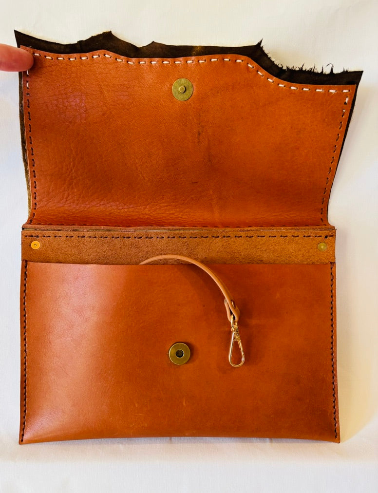 Hair on and leather clutch/crossbody bag