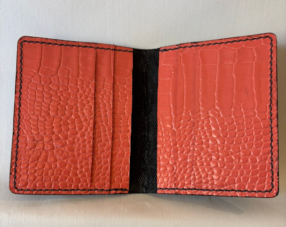 Black embossed micro wallet with stunning pink inner