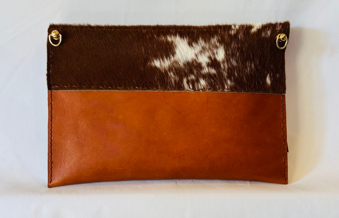 Hair on and leather clutch/crossbody bag