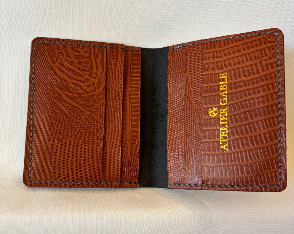 Black saffiano micro card wallet with Tan reptile embossed inner