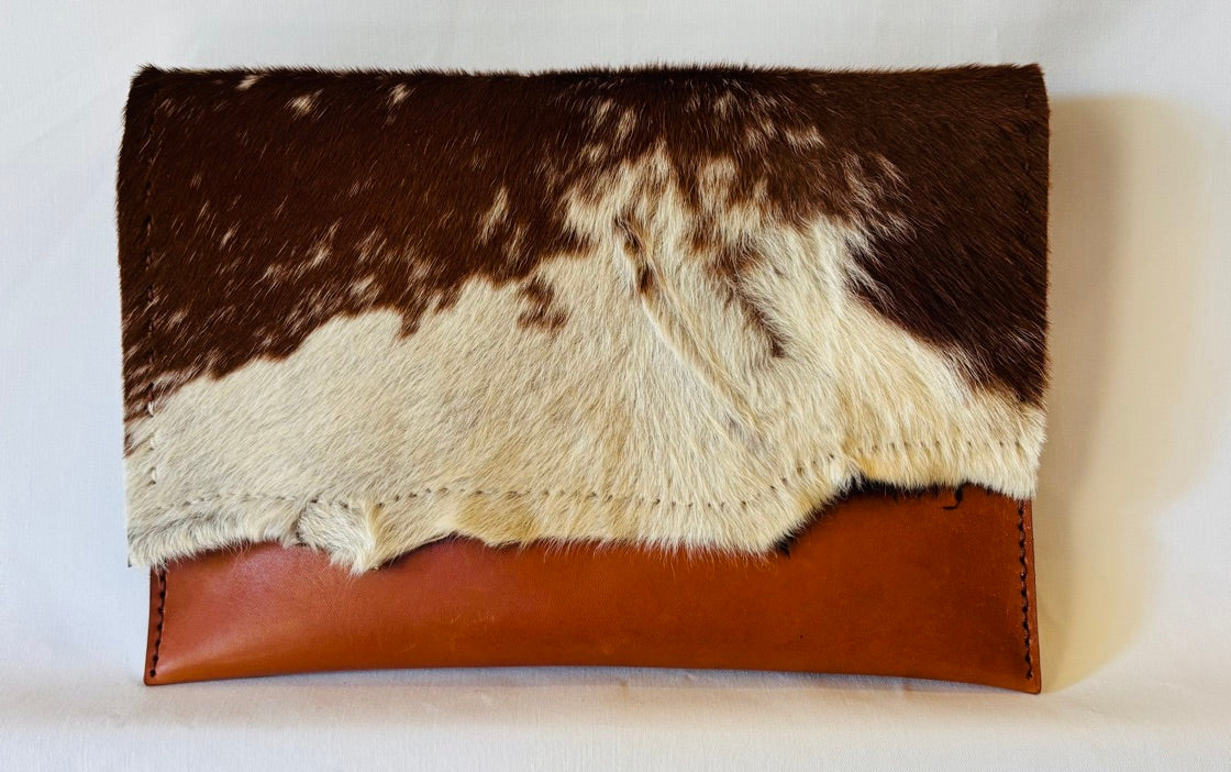 Hair on and leather clutch/crossbody bag